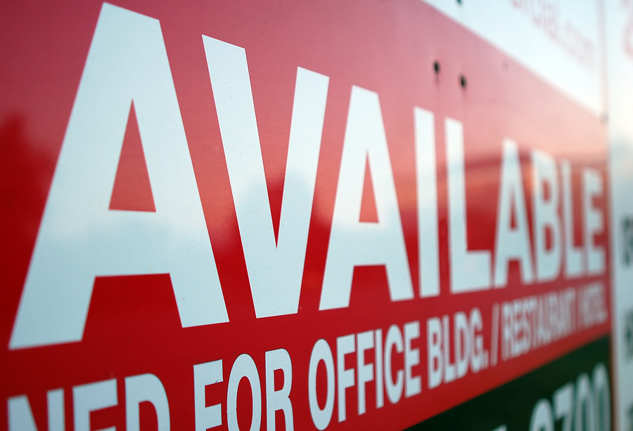 Macro image of a commercial real estate sign with shallow depth of field. ** Note: Shallow depth of field