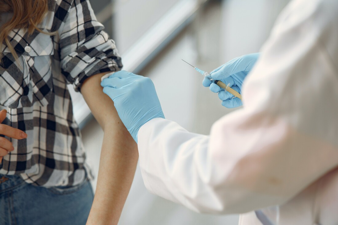 Person receiving vaccine